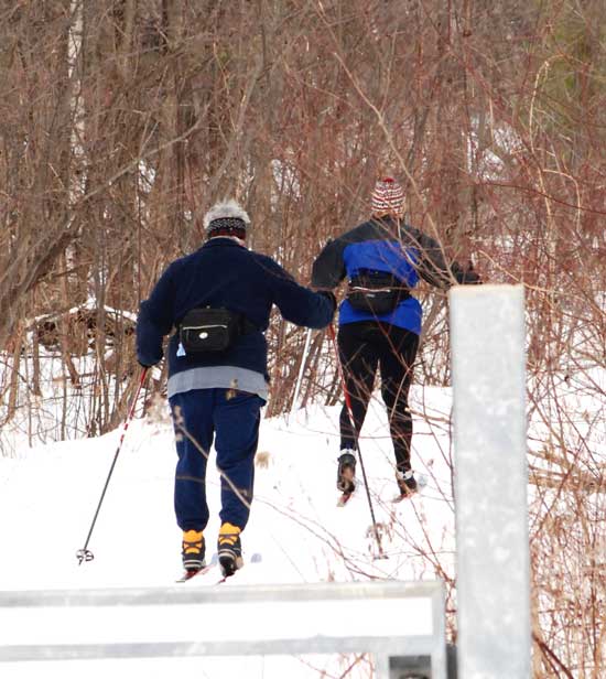 A pair of cross-country skiers hits the trail at Oxbow. (Photo by Sue Fitterman)