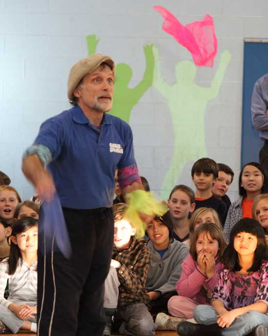 Rick Davis of Circus Smirkus keeps a group of children enchanted on Jan. 29 as he teaches approaches to learning circus skills that can also be applied to academic learning.