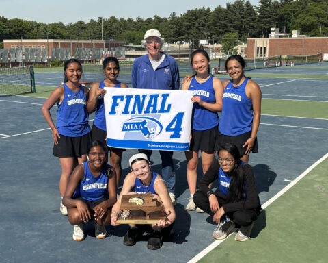 girls tennis with trophy