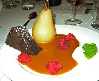 Saving the best for last. Dessert consists of flourless chocolate cake and cider-poached pear in a pool of caramel cream. (Photo by Barbara Kemp)