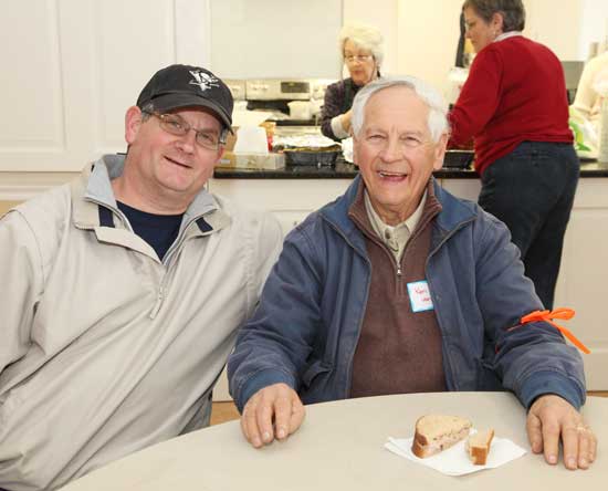 Bill Van Wormer (left) relaxes with his father Ken Van Wormer after completing the walk.